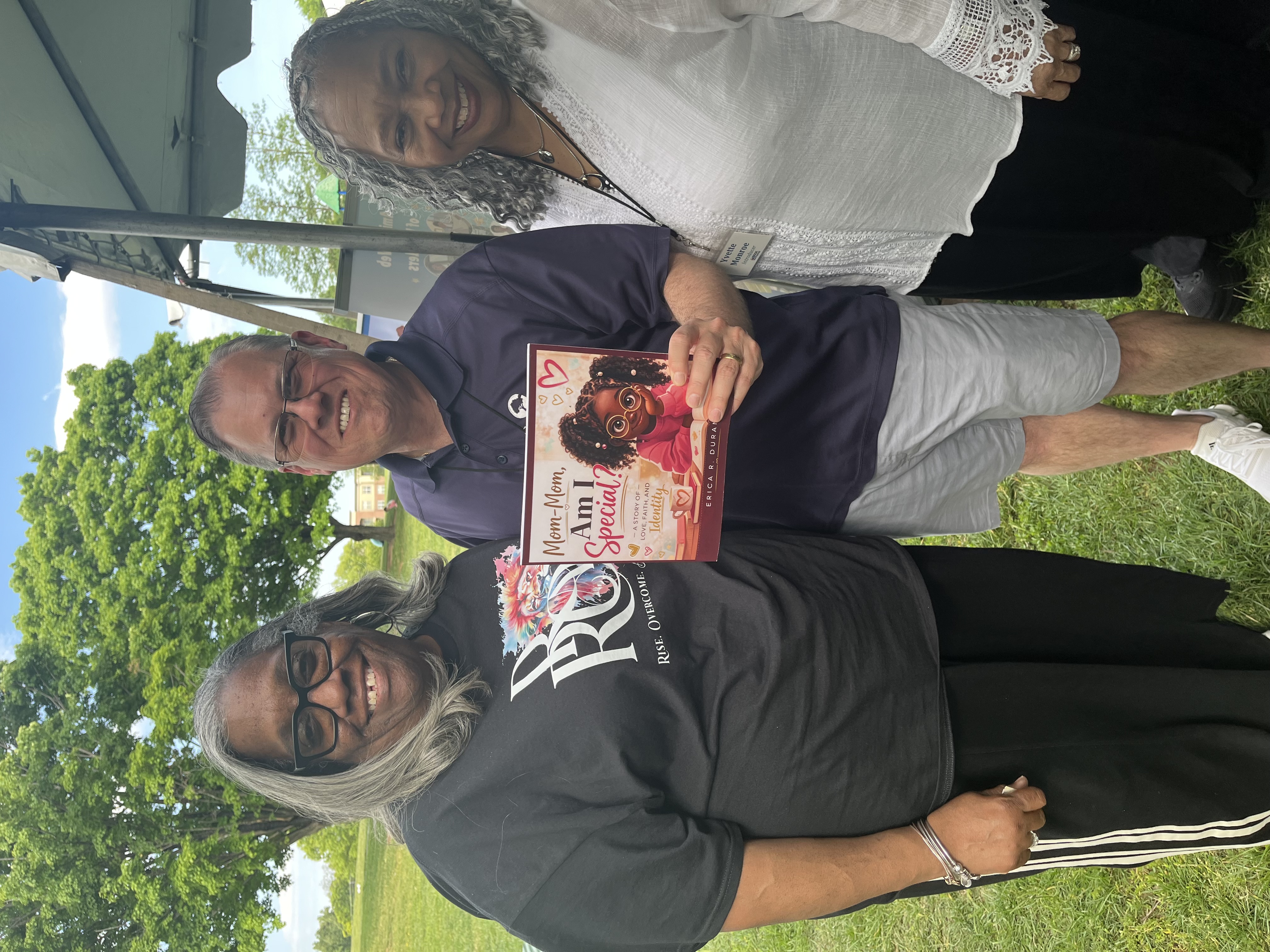 Erica with the mayor of Gaithersburg holding Mom-Mom Am I Special